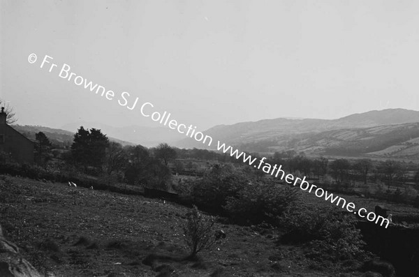 CARLINGFORD HILLS WITH YELLOW GREEN AND RED SHELTER